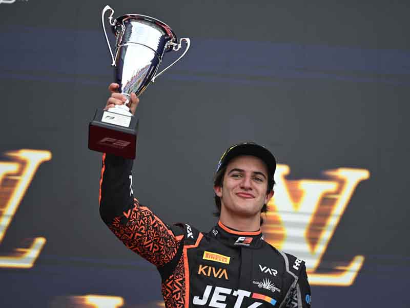 MELBOURNE, AUSTRALIA - MARCH 15: Race winner Santiago Ramos of Mexico and Van Amersfoort Racing (21) on the podium with his trophy during the Round 1 Melbourne Sprint race of the Formula 3 Championship at Albert Park Circuit on March 15, 2025 in Melbourne, Australia. (Photo by Pauline Ballet - Formula 1/Formula Motorsport Limited via Getty Images)